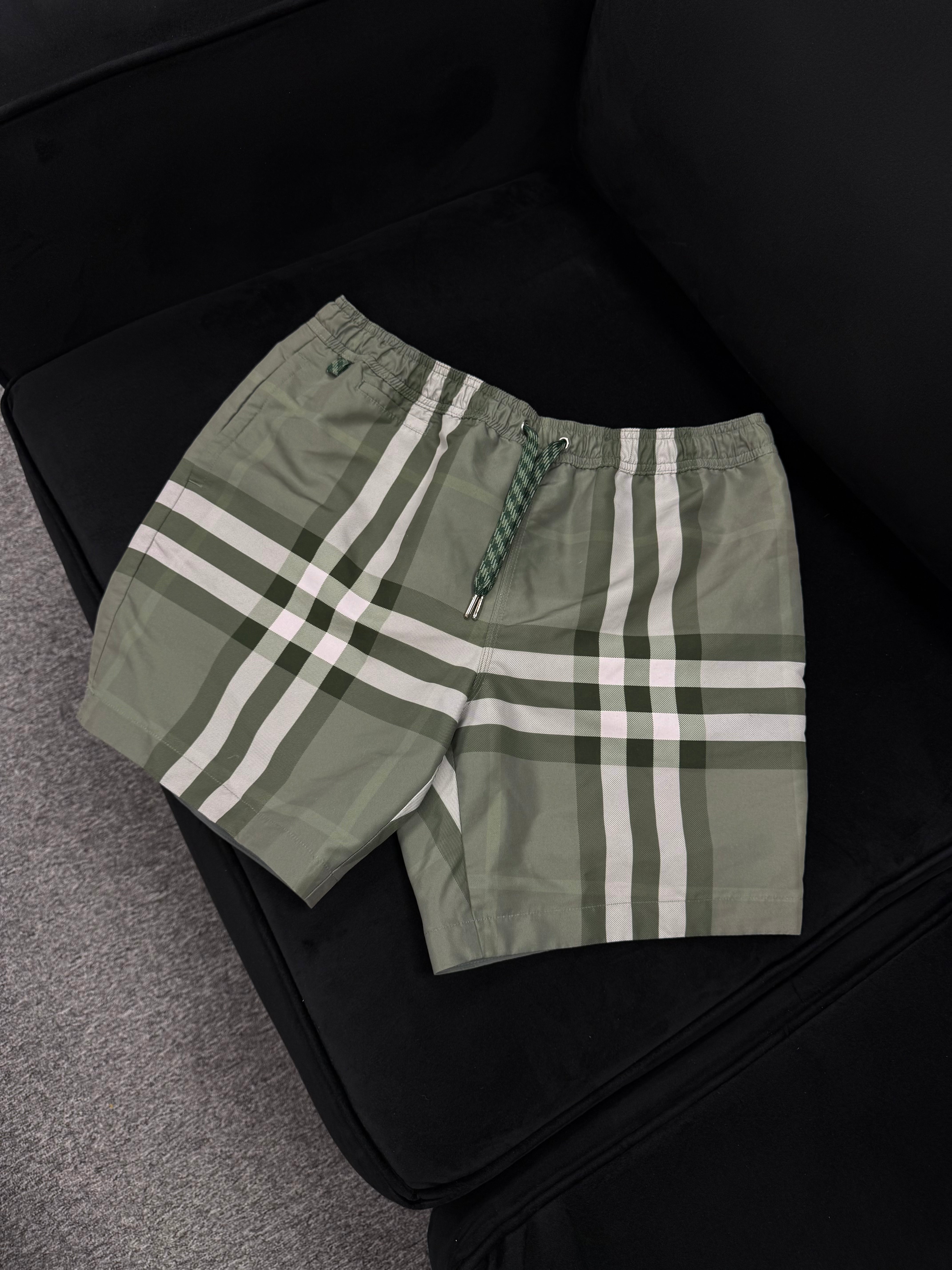 (PRE-OWNED) BURBERRY SWIM SHORTS - KHAKI