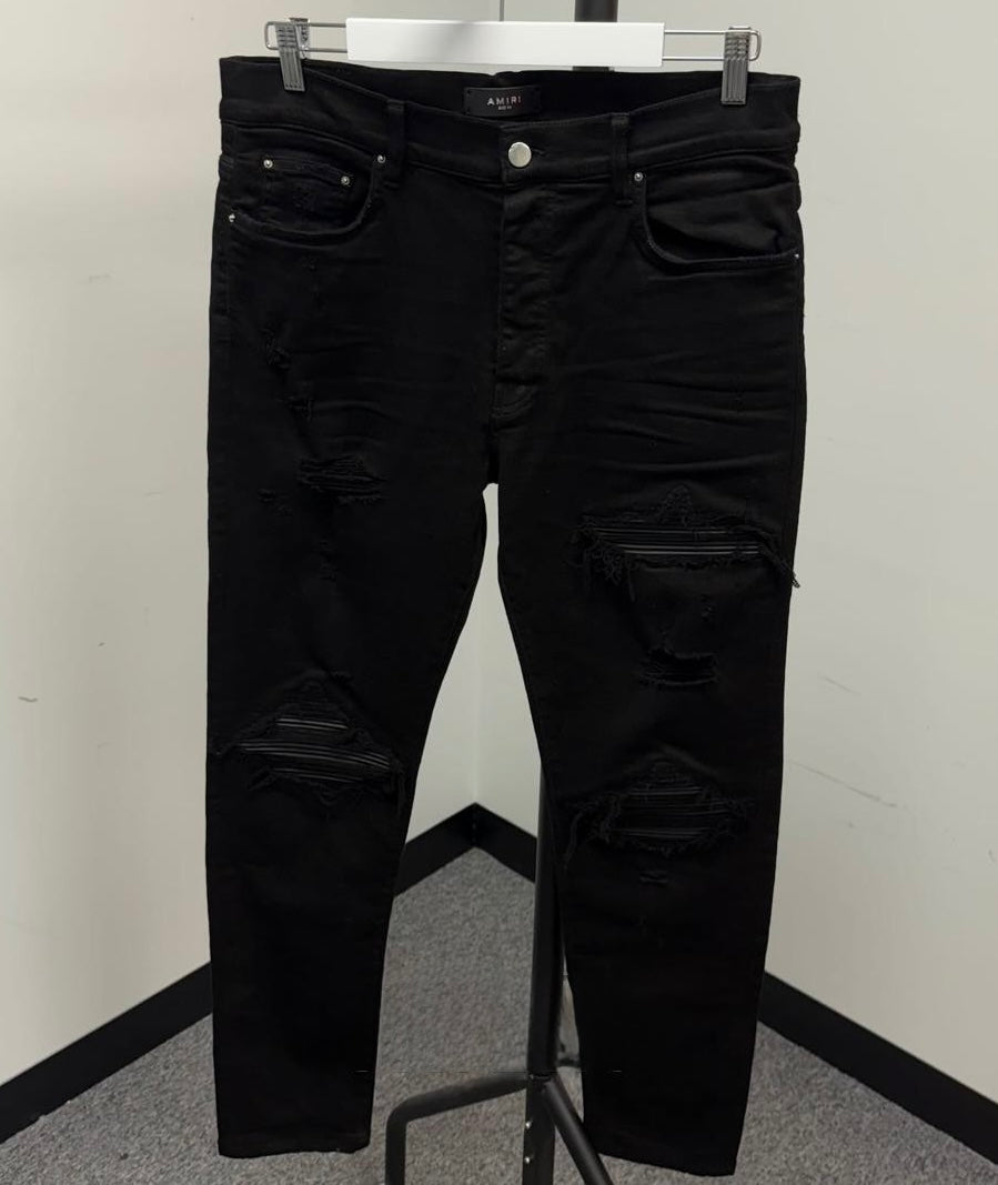 (PRE-OWNED) AMIRI MX1 SKINNY LEATHER PANELLED JEANS - BLACK